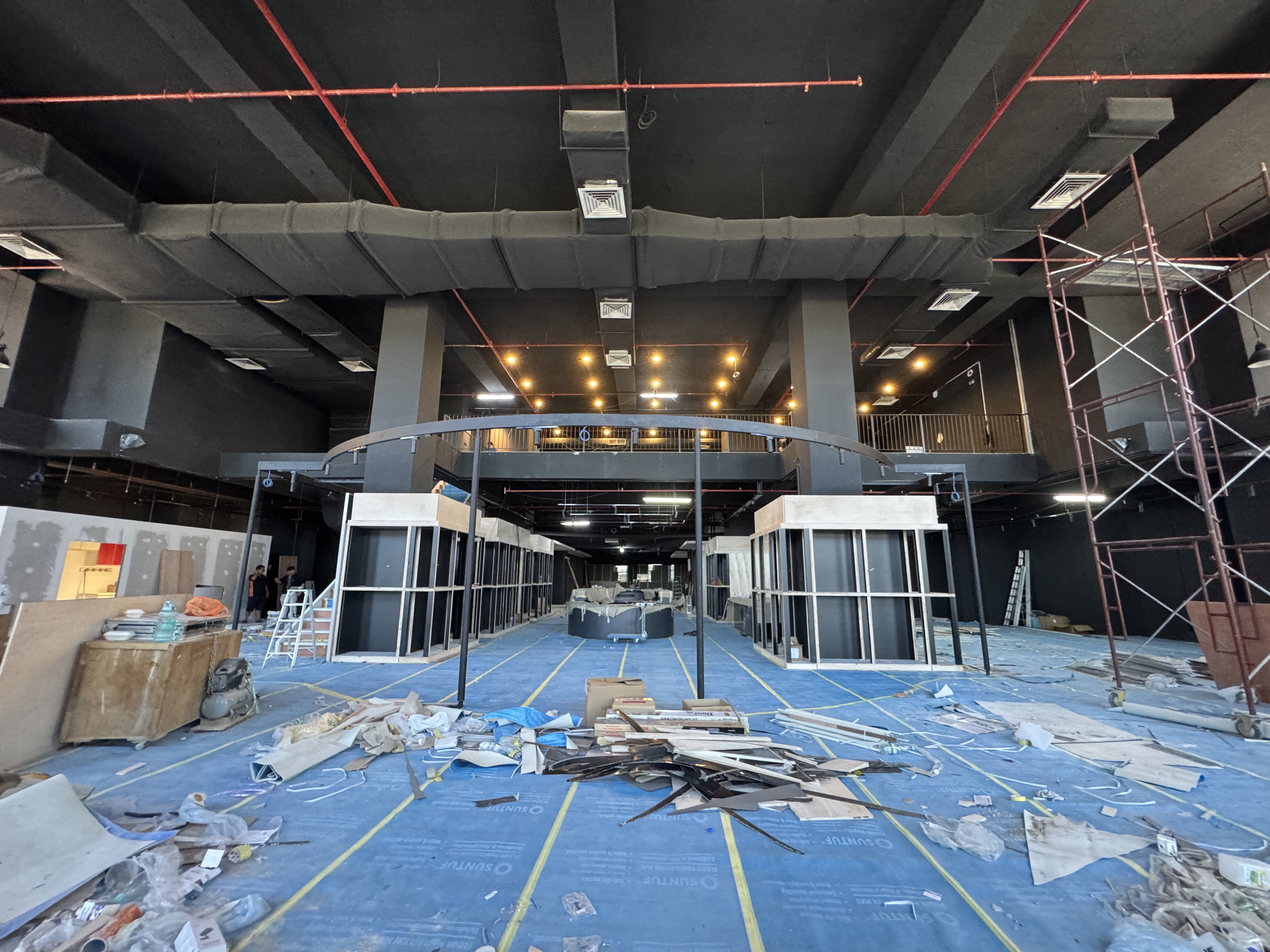 Wide view of the CAW Concept Store interior under construction
