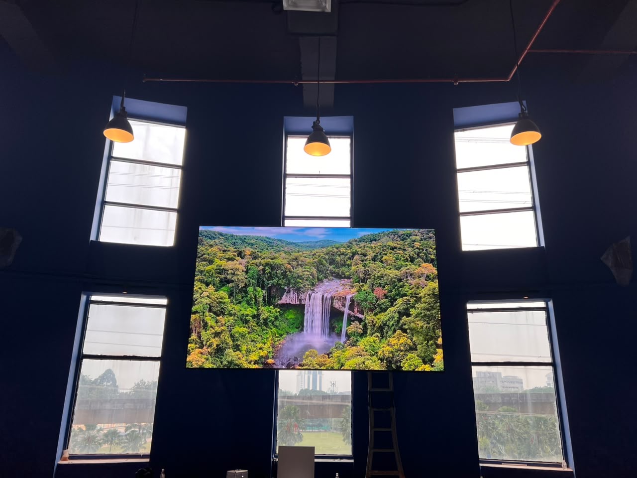 Large digital display installed inside the CAW Concept Store